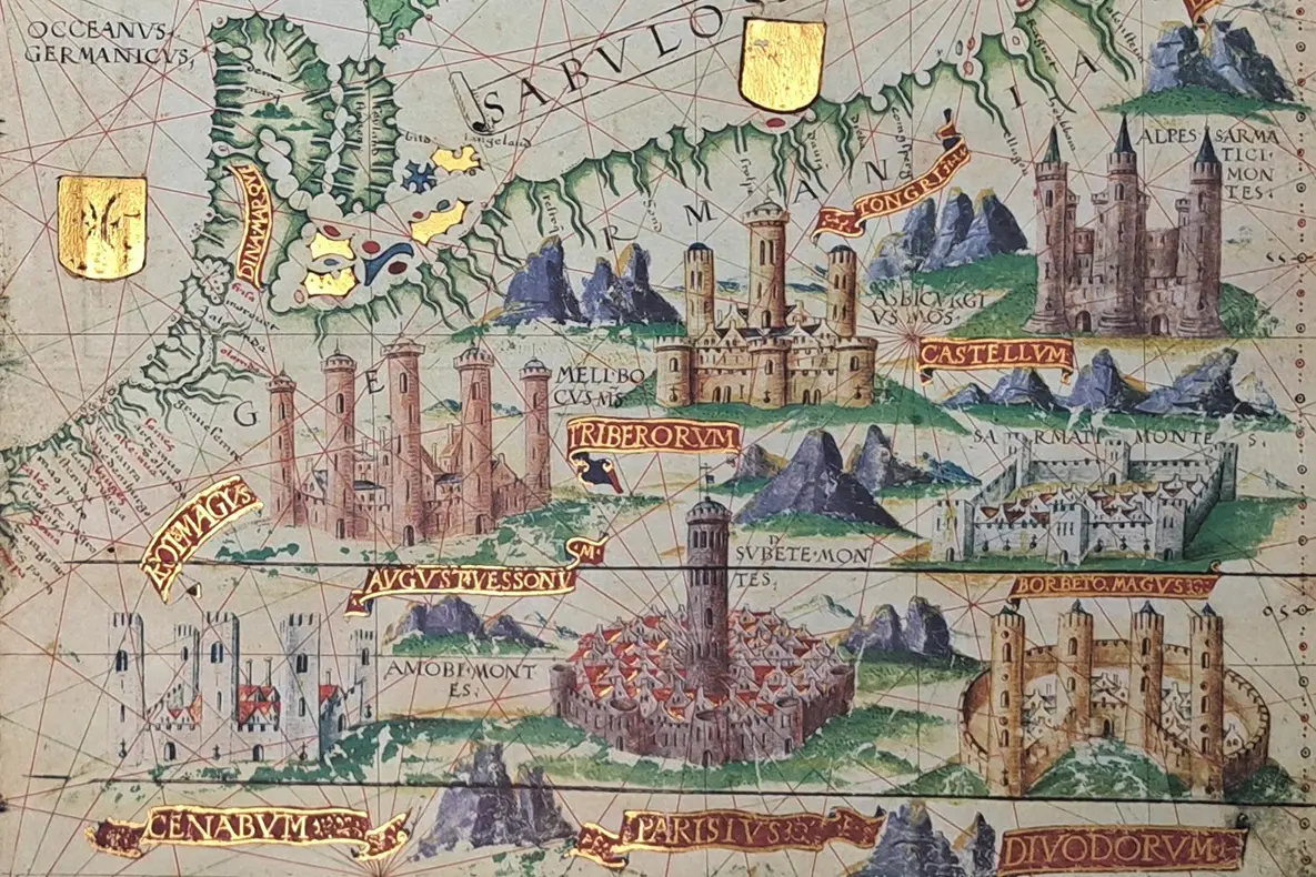 Cropped map facsimile showing European castles and decorated with gold leaf.