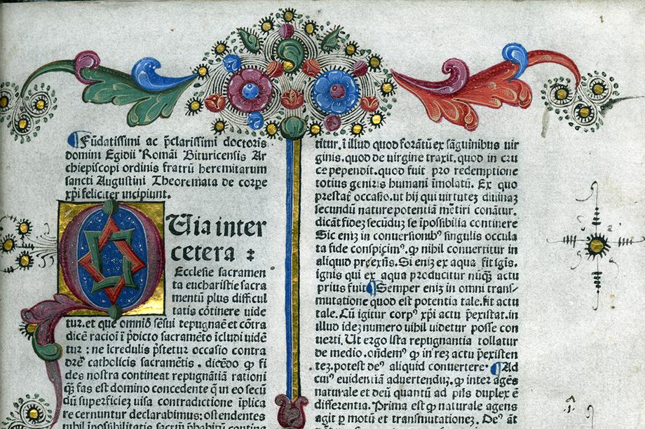 The top half of an early printed manuscript page with ornate illustrations and decorate letters.