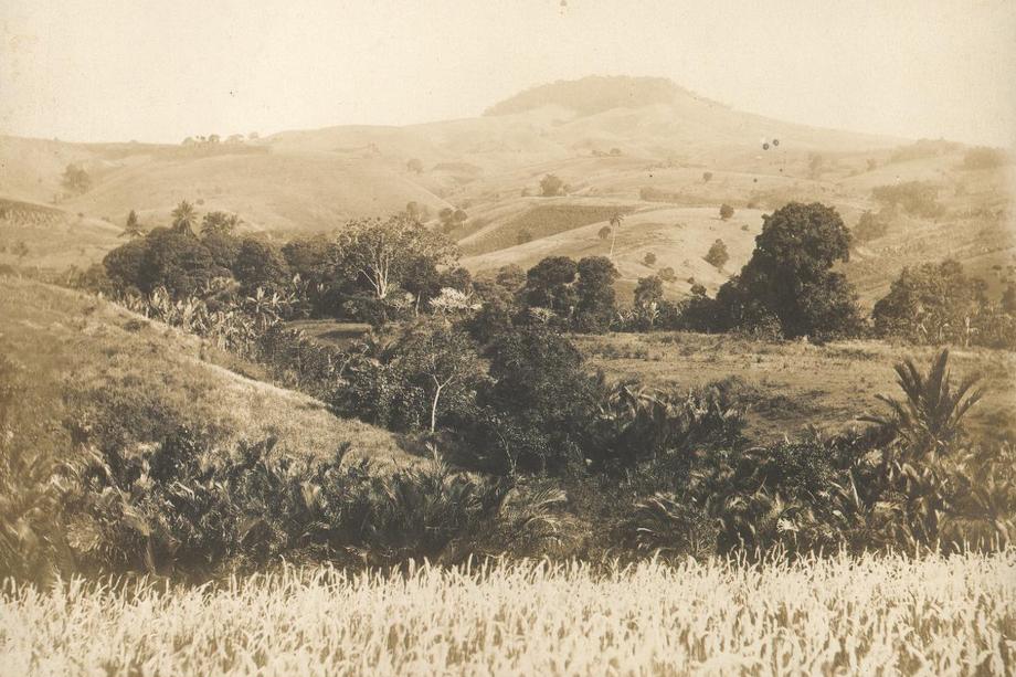 Monochrome photograph of rolling hills in the Philippines countryside.