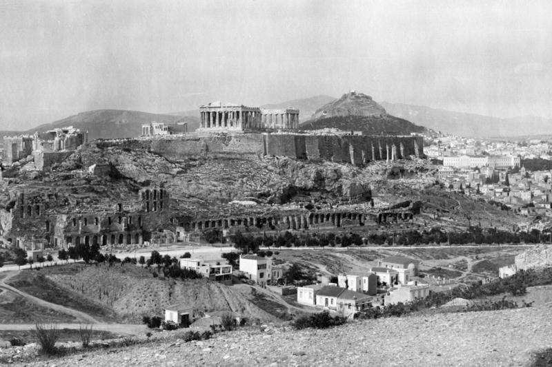 Black and white photo of Athens, Greece, taken from a hill overlooking the city.
